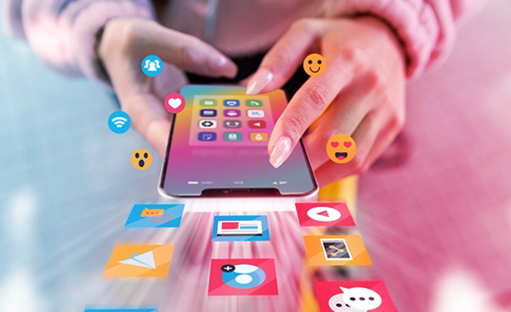 A smartphone user shares content, sparking engagement and positive reactions through paid social marketing.