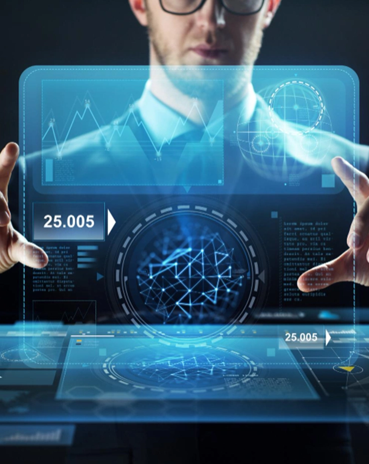 A person interacts with a holographic interface showing advanced analytics
